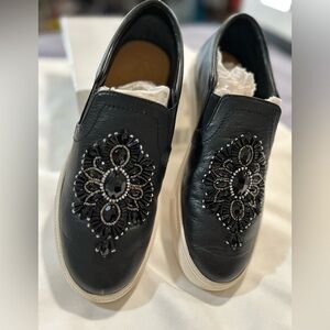 Authentic Brighton slip on black sneaker with beautiful beaded medallion in sz 9